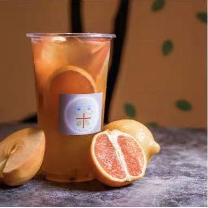 Iced citrus fruit tea with fresh grapefruit and lemon
