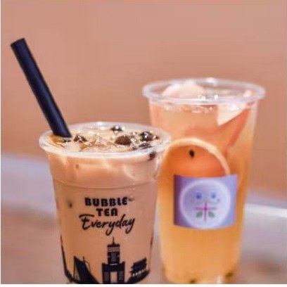 Iced milk tea with boba and a fresh fruit tea at Tea Plus Tea Bar