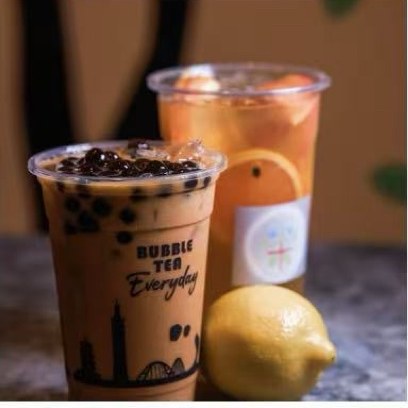 Boba milk tea and a citrus fruit tea at Tea Plus Tea Bar