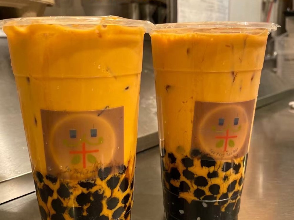 Two cups of Thai milk tea with boba at Tea Plus Tea Bar